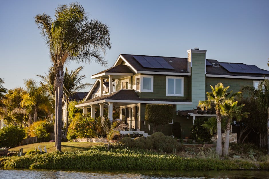 Modern home with residential solar panels installed on the roof